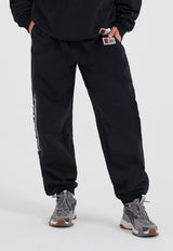 Pantalon de jogging à revers avec logo graffiti Core pour femme - Noir